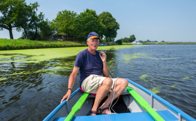 Senior man in boat